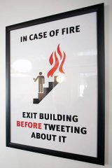 A custom emergency exit sign at Twitters new global headquarters in San Francisco, California, USA 20 Sep 2012. (Peter DaSilva for The New York Times) NYTCREDIT: Peter DaSilva for The New York Times